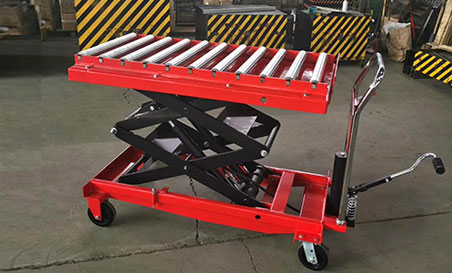 Double scissor manual hydraulic conveyor roller lift table for warehouse.